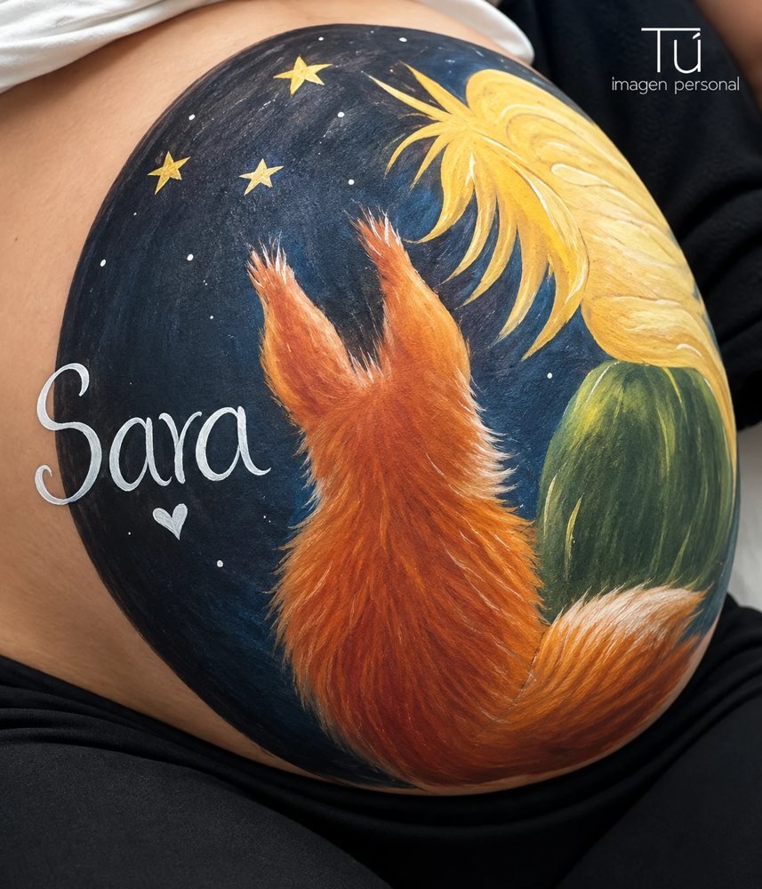 Pintura artística sobre barriga de embarazada, body painting